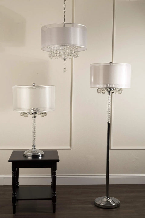 Moiselle Swanky Modern Table Lamp With Chrome Finish, Double Drum Shade in Sheer Off White displayed on side table