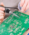 Person soldering PCB with 60-40 Tin Lead Rosin Core Solder Wire For Electronics Soldering, 1.5mm Diameter, 100g Spool