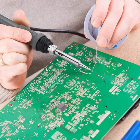 Person soldering PCB with 60-40 Tin Lead Rosin Core Solder Wire For Electronics Soldering, 1.5mm Diameter, 100g Spool