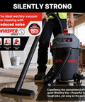 No Break Garage Beast Wet And Dry Shop Vacuum With Ultra Quiet Motor cleaning a floor mess with a powerful hose.