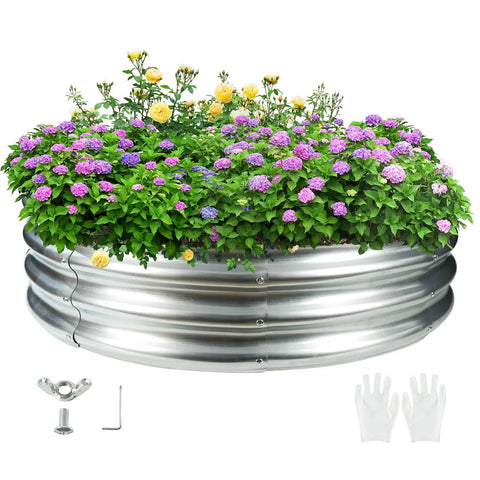 Four Foot Diameter Camp Fire Ring Pit Made From Galvanized Steel, Large Round Heavy Duty Fire Pit In Silver, shown with flowers