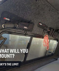 Side view of Tech Panel Small 2.5 By 9.5 Inch Universal Vehicle MOLLE Organizer For Pouches Clips And Gear installed on window