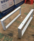 Top Shelf Metal Shelf Brackets Wall Mounts That Crush Heavy Loads, Solid Industrial Design In Crisp White Steel on a workshop floor.