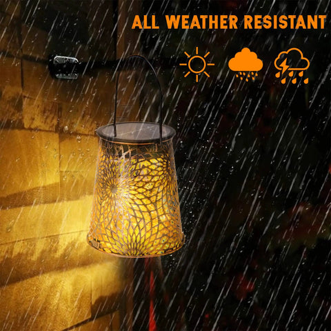 Solar Watering Can With Cascading Lights Two In One Outdoor Hanging Lantern in rain showcasing weather resistance
