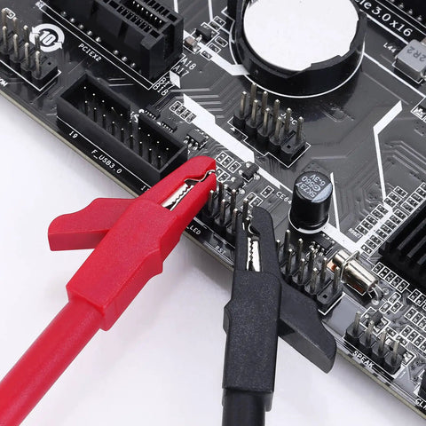 28 Piece Multimeter Test Leads Kit With Replaceable Gold Plated Probes, Alligator Clips connected to a circuit board