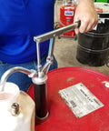 Person using Guardian Lever Action Drum Transfer Pump For 16 To 55 Gallon Drums With 2 Inch Bung And Bushing, oil transfer