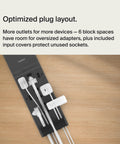 Top view of a black 12-Outlet Surge Protector Power Strip With 12 AC Outlets And 8ft Flat Plug on a wooden tabletop