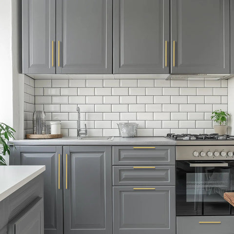 Modern kitchen with grey cabinets featuring gold cabinet pulls 3 inch hole center 30 pack modern zinc alloy drawer handles.