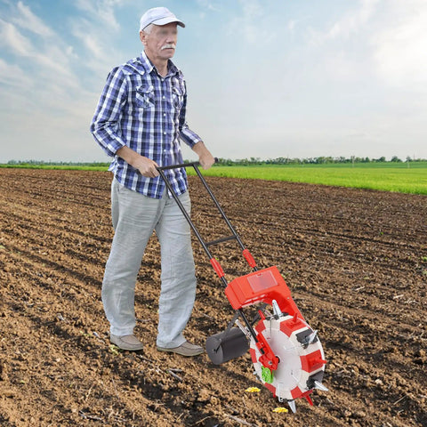 Hand Push Seeder With Six Nozzles For Precise Garden Planting Walk Behind Seed Planter in use in a field