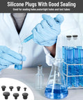 Scientist using 90 Pcs Silicone Rubber Hole Plugs Set With 9 Diameter Sizes for sealing test tubes in laboratory