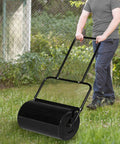 Man using water filled lawn roller for garden and lawn 16 gallon capacity 20 inch steel drum push or tow behind design