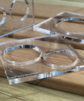 Sturdy Hardened Acrylic Three Piece Router Template Set For Woodworking And Circle Inlay Projects 4 Inch By 3 Point 92 Jig Kit on wood.