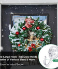 Christmas wreath hanging on a door using 4 Pack Large Suction Cup Hooks For Doors And Windows No Tools No Fuss Wreath Hanger Upgraded 1.9 Inch Diameter Holds Up To 22 Lbs For Front Door Glass Shower Mirrors And Tile.