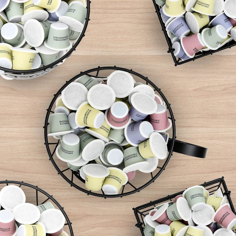 Top view of Go To Rustic Metal K Cup Pod Holder with wooden base, filled with colorful K-Cup pods, on light wood countertop.