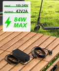 36V Ebike Charger For Vivi Spa Series 42V 2A Replacement, charger on wooden table with cables, inputs and outputs displayed