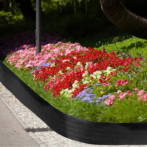 6 Inch Tall Landscape Plastic Edging Kit With 66 Ft Length And Hammer Spikes For Easy Install Garden Border For Flower Beds Lawns And Yards Black Border To Define Edges And Keep Mulch In Place lining a colorful garden bed.