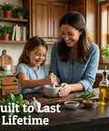 Mother and daughter using Heavy Duty Granite Mortar And Pestle Set Hand Carved From Natural Stone Two Cup Grinder Bowl in kitchen