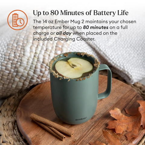 Slick App Controlled 14 Oz Smart Heated Coffee Mug With Rechargeable Base And Glow Led Display Keeps Your Joe Piping Hot From First Sip To Final Drop Certified Renewed For Daily Grind on a wooden surface with cinnamon sticks.