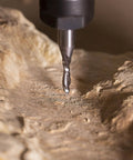 Close-up of Carbide Downcut Router Bit Set For Woodworking With 3/8 Inch Cutting Diameter in action on wood surface