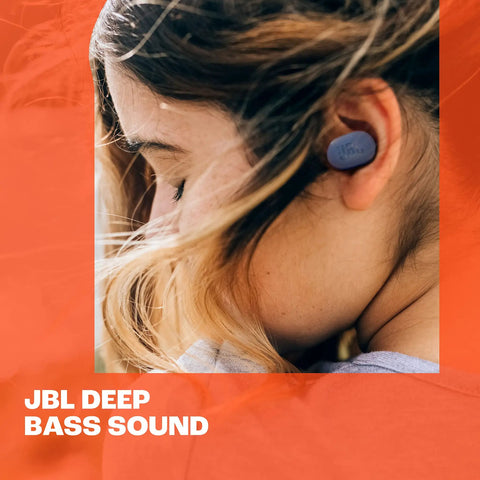 Person wearing Tune Buds True Wireless Earbuds With Noise Cancellation And Pure Bass Sound Bluetooth Five Point Three 4 Microphone System For Crisp Calls All Day Battery Life Up To 48 Hours IPX Water And Dust Resistant Black.