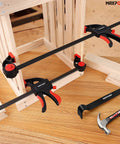 Heavy Duty Woodworking Bar Clamp Set, 12 Inch Two Pack And 6 Inch Two Pack, One Hand Quick Release Clamps on wood project