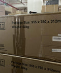 Large cardboard box with package size 955x760x312mm and 60kg weight, stored in a warehouse setting with other boxes.