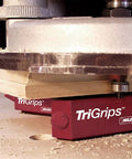 TriGrips triangle bench grippers in use, elevating woodworking project 1.2 inches, Triangle Bench Cookie Work Grippers 4 Pack
