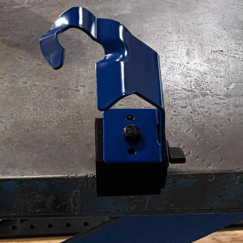 Side view of Arc-Zone MIG welding torch holder with magnetic base; blue metal clamp and adjustment knob.