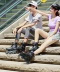 Unisex Inline Skates For Girls And Boys, Adjustable Roller Blades For Women And Men, city setting, outdoor stairs, daytime.