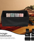 Hella Durable Non Woven Underwear Drawer Organizer Unit With Multiple Divided Compartments To Keep Your Socks Locked Tight, showing rolled socks in a black fabric organizer.