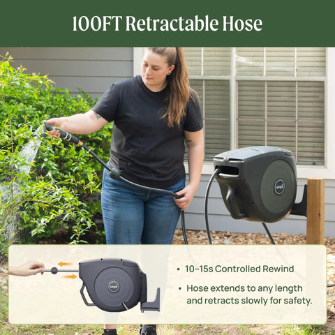 Person using Retractable Garden Hose Reel With Automatic Rewind Easy Setup Wall Mounted 100 Ft Seaweed Green outdoors