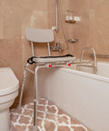 Pro-Slide Shower Chair And Tub Transfer Bench With Cutout, adjustable height, in a bathroom over a bathtub.