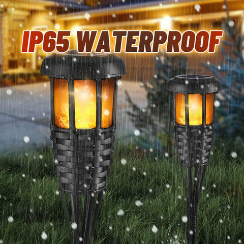 Four Pack Outdoor Tiki Torches With Realistic Flickering Flame Waterproof Bamboo Handwoven Rattan Design In Black in yard