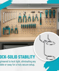 5 Piece Pegboard Screwdriver Holder Set With Double Ring Tool Organizers For Screwdrivers Pliers Wrenches And Hammers Wall Mount Hooks And Hangers For Easy Access Grab And Go Space Saving Garage Tool Storage installed on pegboard with tools.