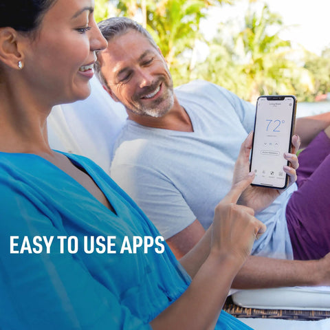 Man and woman using smartphone app to control T5 WiFi Smart Thermostat With 7 Day Programmable Touchscreen Alexa Ready Geofencing Technology