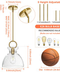 Super Sleek Brushed Gold Pendant Light For Kitchen Island Featuring Fully Adjustable Hanging Cord And Large Clear Glass Shade dimensions and details.