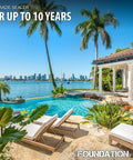 Heavy Duty Water Based Silane Siloxane Concrete Sealer Fends Off Water Sneaking Into Masonry For Brick Pavers And Stone Bringing A Shield That Slaps Moisture Away While Locking In Raw Texture In This Solid Five Gallon Pro Tank in a tropical outdoor setting with a pool and palm trees.