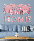 Rose Gold Home Wall Mirror Decal 30 Piece Set With HOME Letters And Round Acrylic Stickers in living room