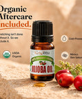 Bottle of jojoba oil included in 54 Piece Ear Gauge Stretching Kit For Beginners And Newbies with organic certification.