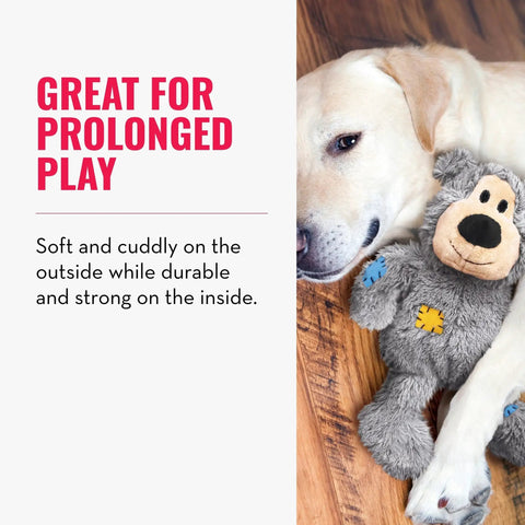Dog resting with Wild Knots Bear Dog Toy With Internal Knotted Rope Skeleton Durable Plush Chew Toy For Medium To Large Dogs