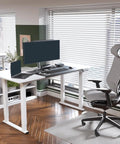 Massive 63 X 28 Electric Standing Desk Built With A Badass Four Leg Frame, modern home office setup with ergonomic chair.