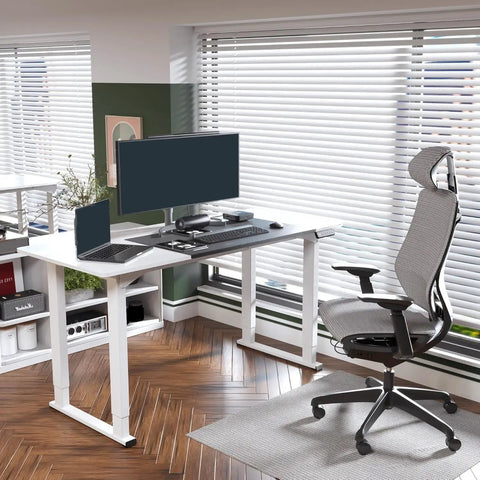Massive 63 X 28 Electric Standing Desk Built With A Badass Four Leg Frame, modern home office setup with ergonomic chair.