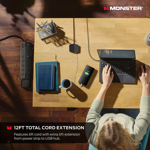 Overhead view of a Detachable Magnetic Mount Surge Protector Power Center with laptop and 12ft total cord extension on desk