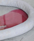 Heavy Duty Polypropylene Absorbent Socks For Flood Fighting Zero Sweat With Leaks Straight Up Industrial Grade Drain Guards in use with oil spill.
