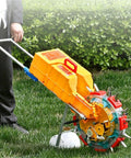 Person using Eight Outlet Hand Push Seed Drill And Fertilizer Spreader For Precise Planting Depth And Spacing In Your Garden outdoors