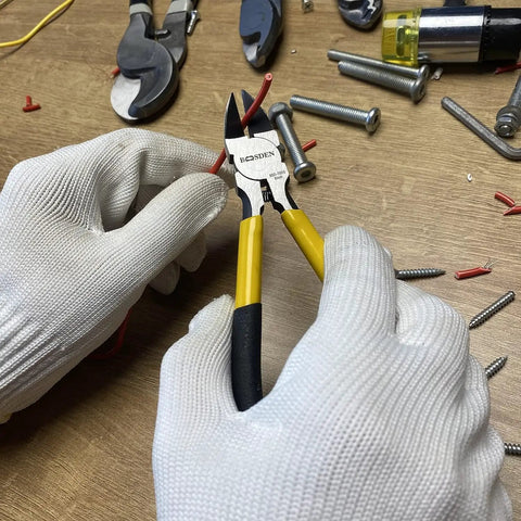 Five Inch Wire Cutters Set Five Pack Pro Grade Diagonal Cutting Pliers in use on tough wire with yellow black grips, high carbon steel