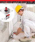 Construction worker using 11 inch stainless steel drywall finishing trowel and 13 inch aluminum hawk board holder for concrete masonry projects.