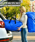 Person loading car with Heavy Duty Blue Moving Bags With Sturdy Zipper Handles And Backpack Straps Ditch The Moving Boxes