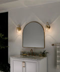 Brinley 11.5 Inch Wall Sconce In Champagne Bronze With Clear Glass Mason Jar Look above bathroom vanity mirror