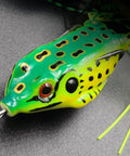 5 Pack Frog Lure Topwater Fishing Crankbaits Realistic Frog Soft Bait With 3D Eyes Lifelike Swimming Action Weedless Freshwater Bass Snakehead Musky Tackle 5.5cm 8g Bright Blue Green Yellow, close-up showing green-yellow coloration and 3D eyes.